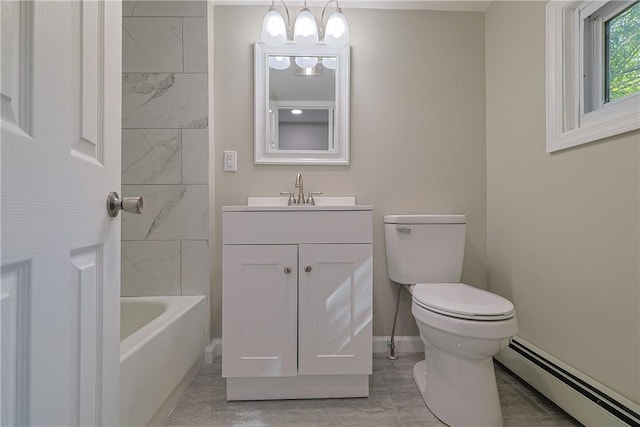 full bathroom with toilet, vanity, tiled shower / bath combo, and a baseboard heating unit