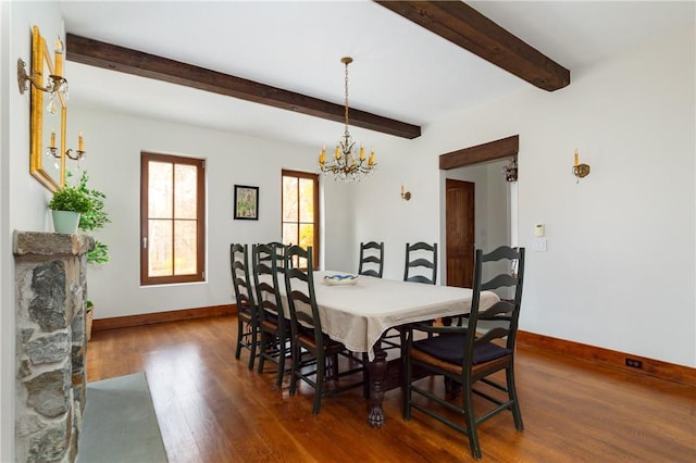 dining area with beam ceiling, a notable chandelier, and dark hardwood / wood-style flooring