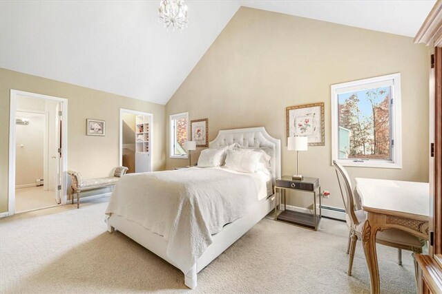 bedroom with connected bathroom, high vaulted ceiling, light colored carpet, and a baseboard radiator