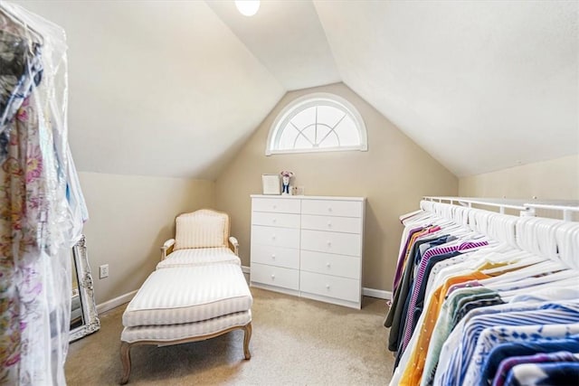 carpeted bedroom featuring vaulted ceiling