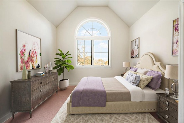 bedroom featuring carpet flooring and lofted ceiling