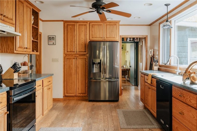 kitchen featuring black appliances, crown molding, hanging light fixtures, ceiling fan, and light hardwood / wood-style floors