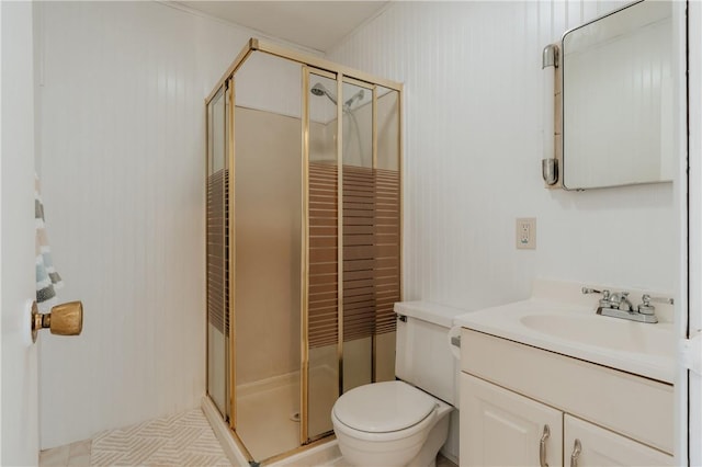 bathroom featuring vanity, toilet, walk in shower, and wooden walls