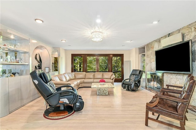 living room with light hardwood / wood-style floors