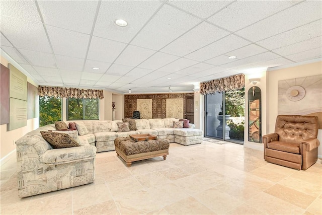 living room featuring a paneled ceiling