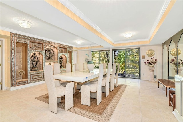 dining space with crown molding and light tile patterned floors