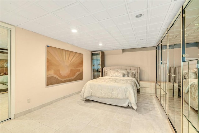 bedroom featuring light tile patterned floors