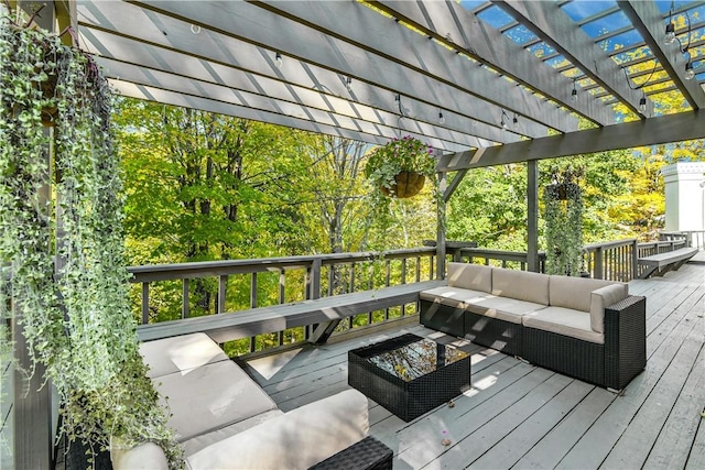 wooden terrace with an outdoor living space and a pergola