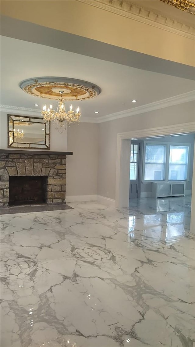 unfurnished living room featuring a notable chandelier, crown molding, and a fireplace