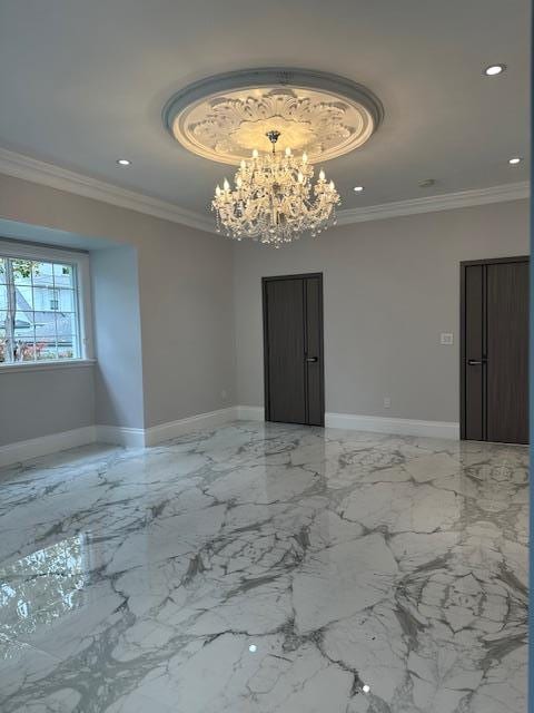 unfurnished dining area with a chandelier and ornamental molding