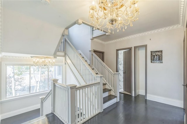 staircase featuring ornamental molding and a notable chandelier