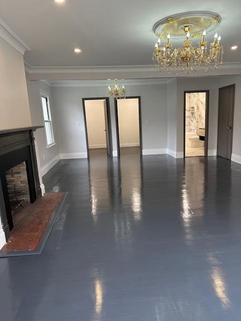 unfurnished living room with crown molding and an inviting chandelier