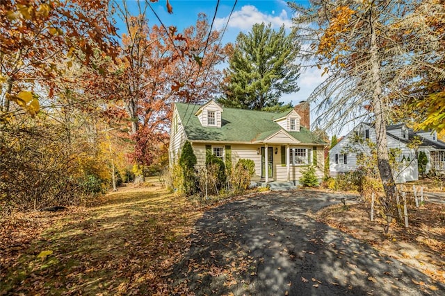 view of new england style home