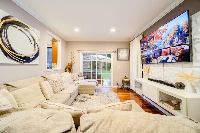 home theater with hardwood / wood-style floors and crown molding