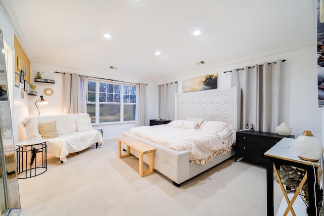 bedroom with light carpet and ornamental molding