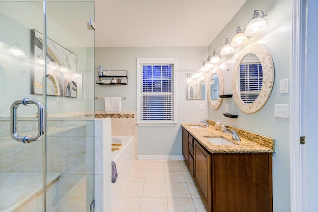 bathroom featuring tile patterned flooring, vanity, and independent shower and bath