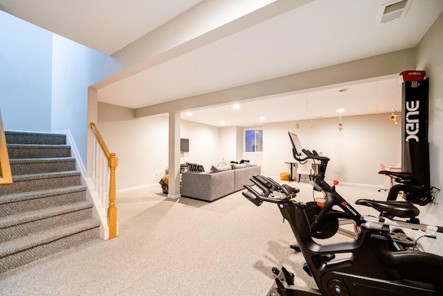 exercise area featuring carpet floors