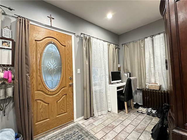 entrance foyer with radiator heating unit