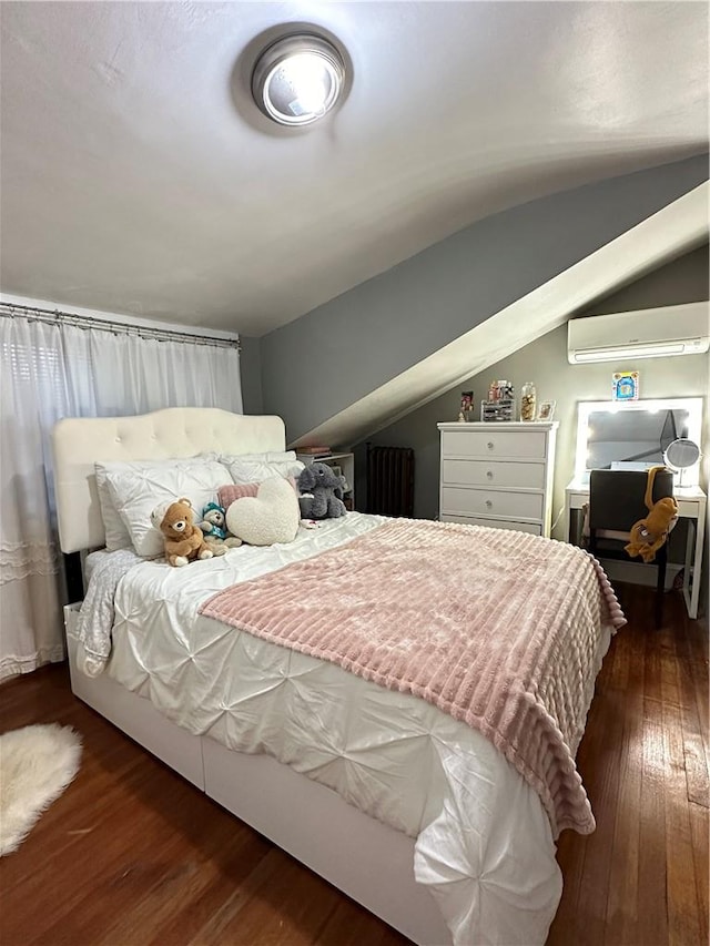 bedroom featuring dark hardwood / wood-style floors and a mail area