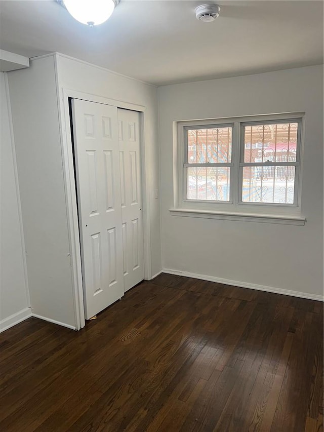 interior space with dark wood-type flooring