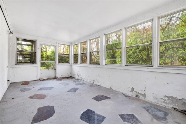 unfurnished sunroom featuring a healthy amount of sunlight