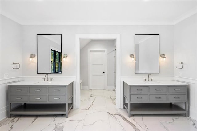 bathroom with vanity and ornamental molding