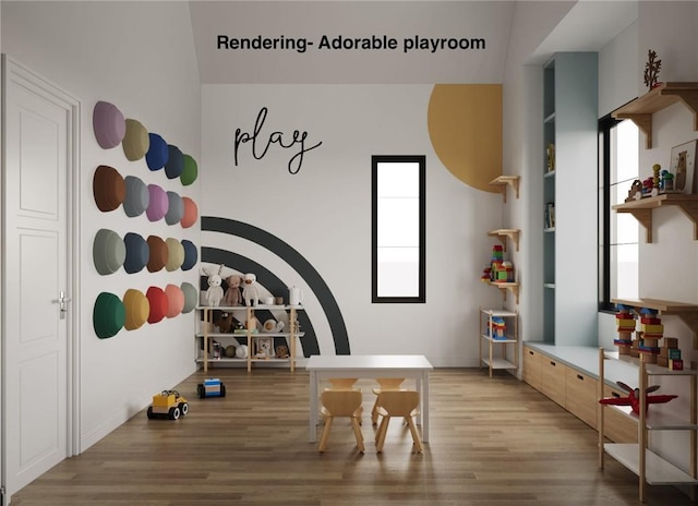 playroom featuring plenty of natural light and light hardwood / wood-style flooring