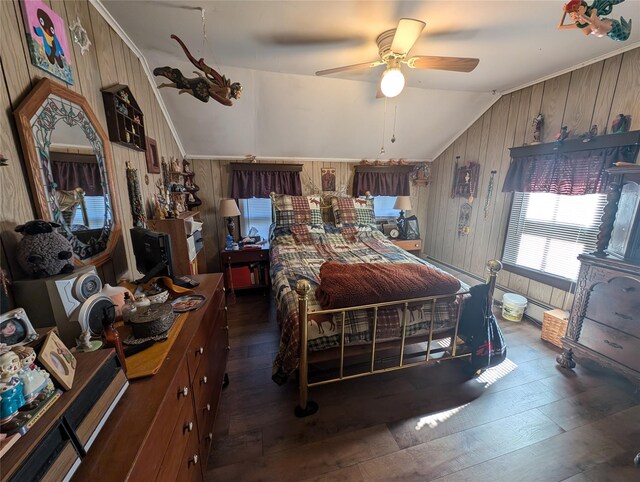 bedroom featuring dark hardwood / wood-style floors, ceiling fan, wooden walls, and vaulted ceiling