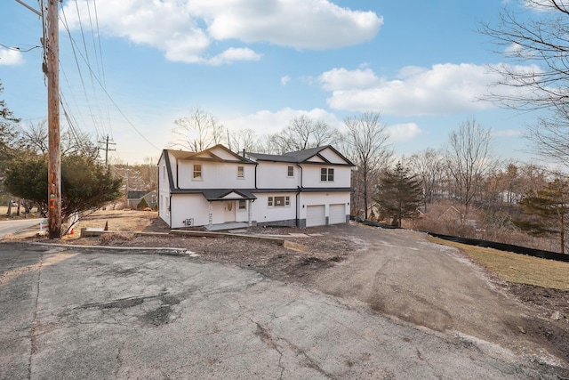 view of front of house featuring driveway and an attached garage