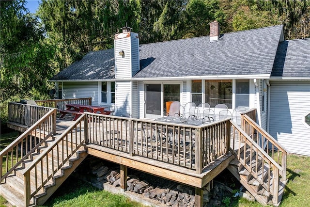 rear view of house with a deck