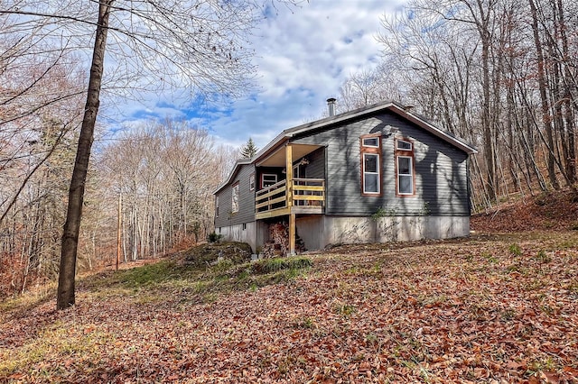 view of property exterior with a balcony