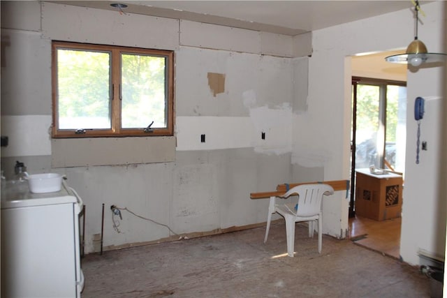 interior space featuring washer / dryer and plenty of natural light