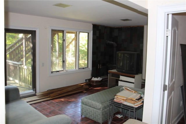 living room with a wood stove