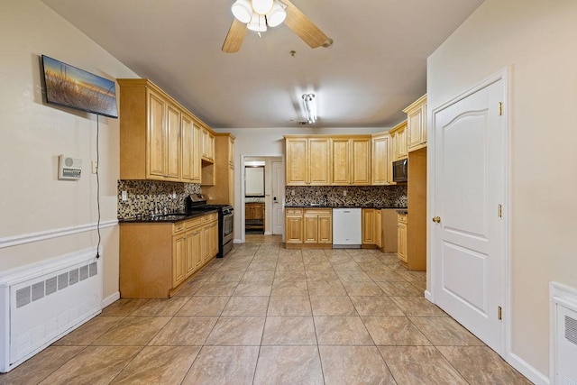 kitchen with radiator heating unit, black gas range, white dishwasher, and light brown cabinets