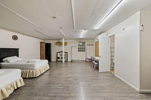 bedroom featuring hardwood / wood-style floors