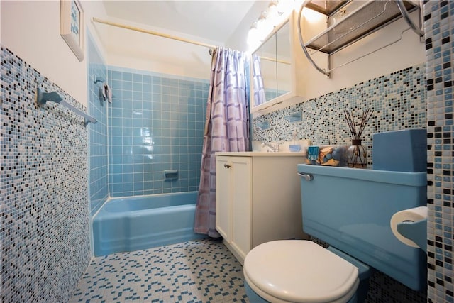 full bathroom featuring vanity, toilet, shower / bath combo with shower curtain, tile walls, and tasteful backsplash