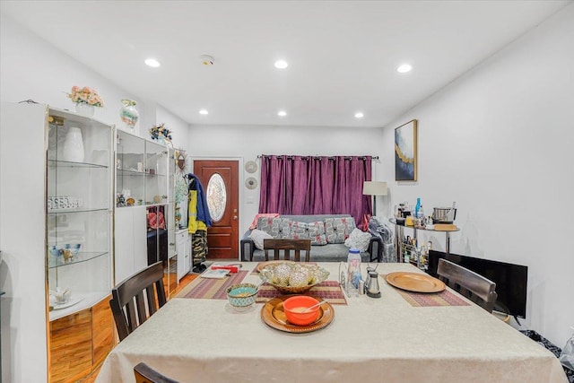 dining area with wood-type flooring