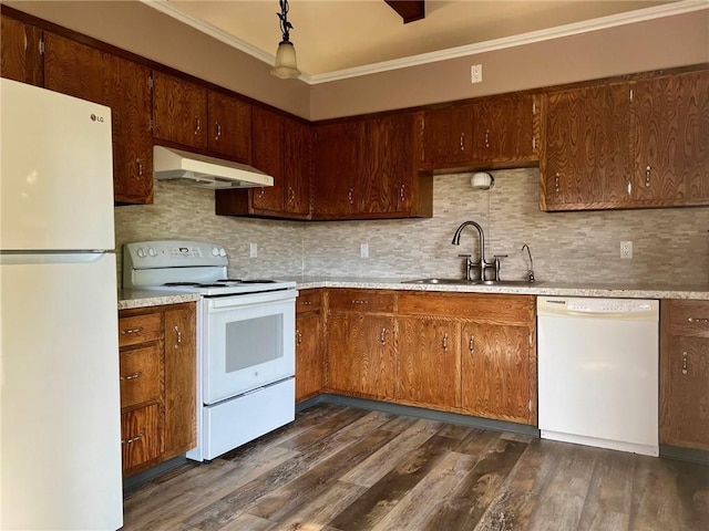 kitchen with white appliances, crown molding, sink, dark hardwood / wood-style floors, and tasteful backsplash