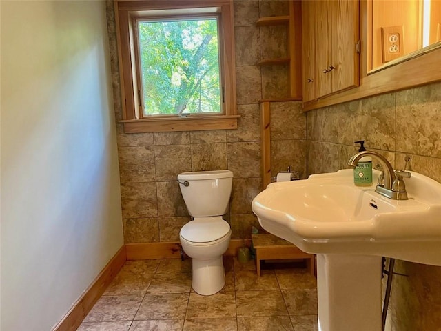 bathroom with toilet and sink