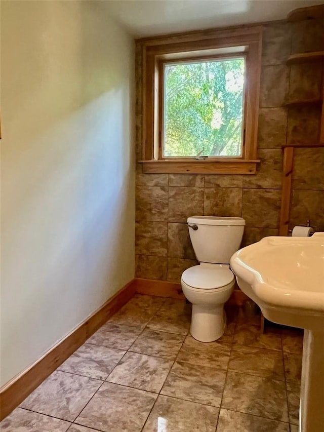 bathroom featuring toilet