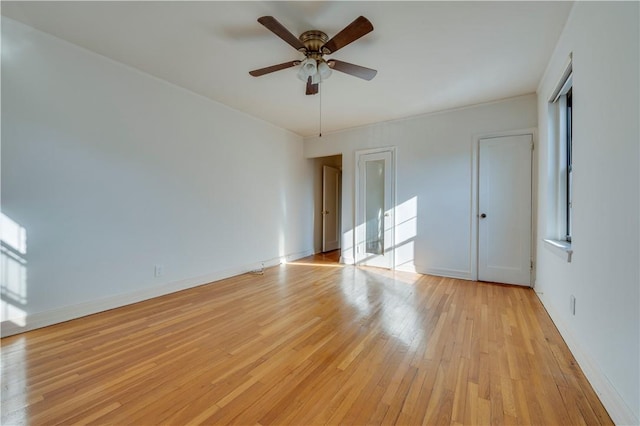 interior space with ceiling fan and light hardwood / wood-style floors