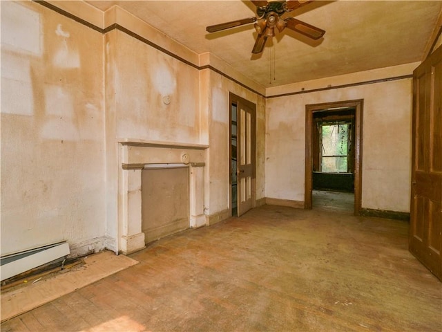 unfurnished living room featuring ceiling fan and a baseboard heating unit