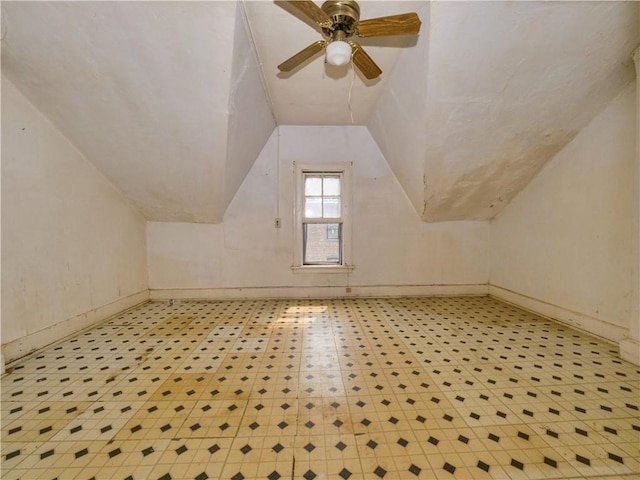 bonus room with vaulted ceiling and ceiling fan