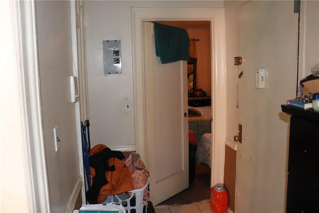 hallway featuring light tile patterned floors