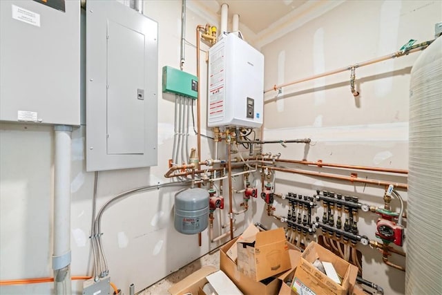 utility room with tankless water heater and electric panel