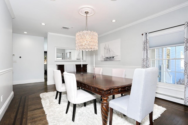 dining room with crown molding, baseboard heating, a chandelier, and dark parquet flooring