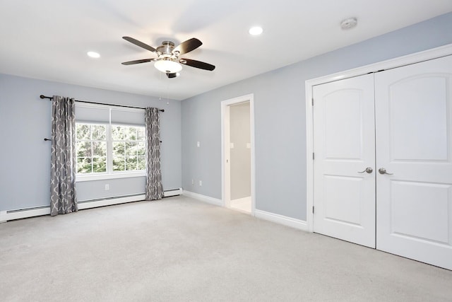 unfurnished bedroom with a closet, ceiling fan, and light carpet