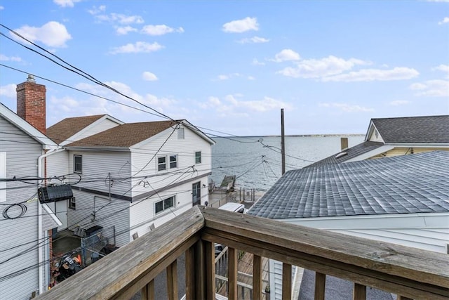 wooden deck with a water view