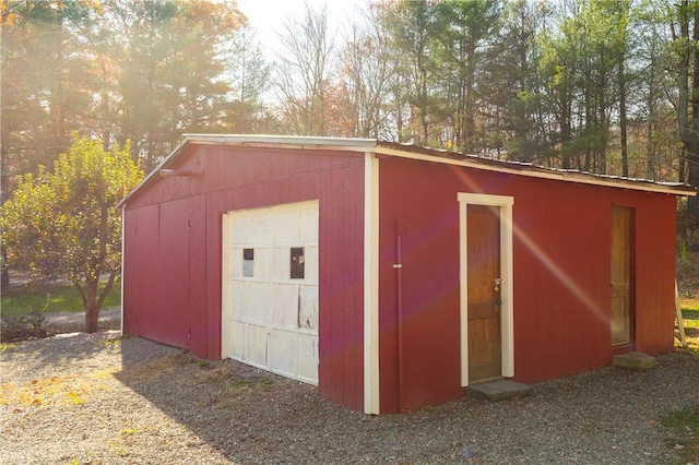 view of outbuilding featuring a garage