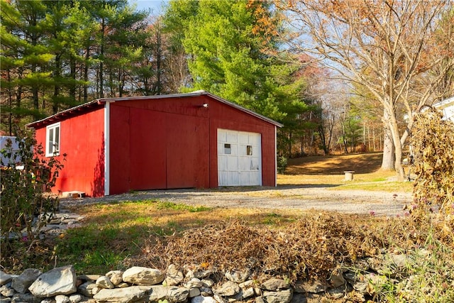 view of outbuilding with a garage